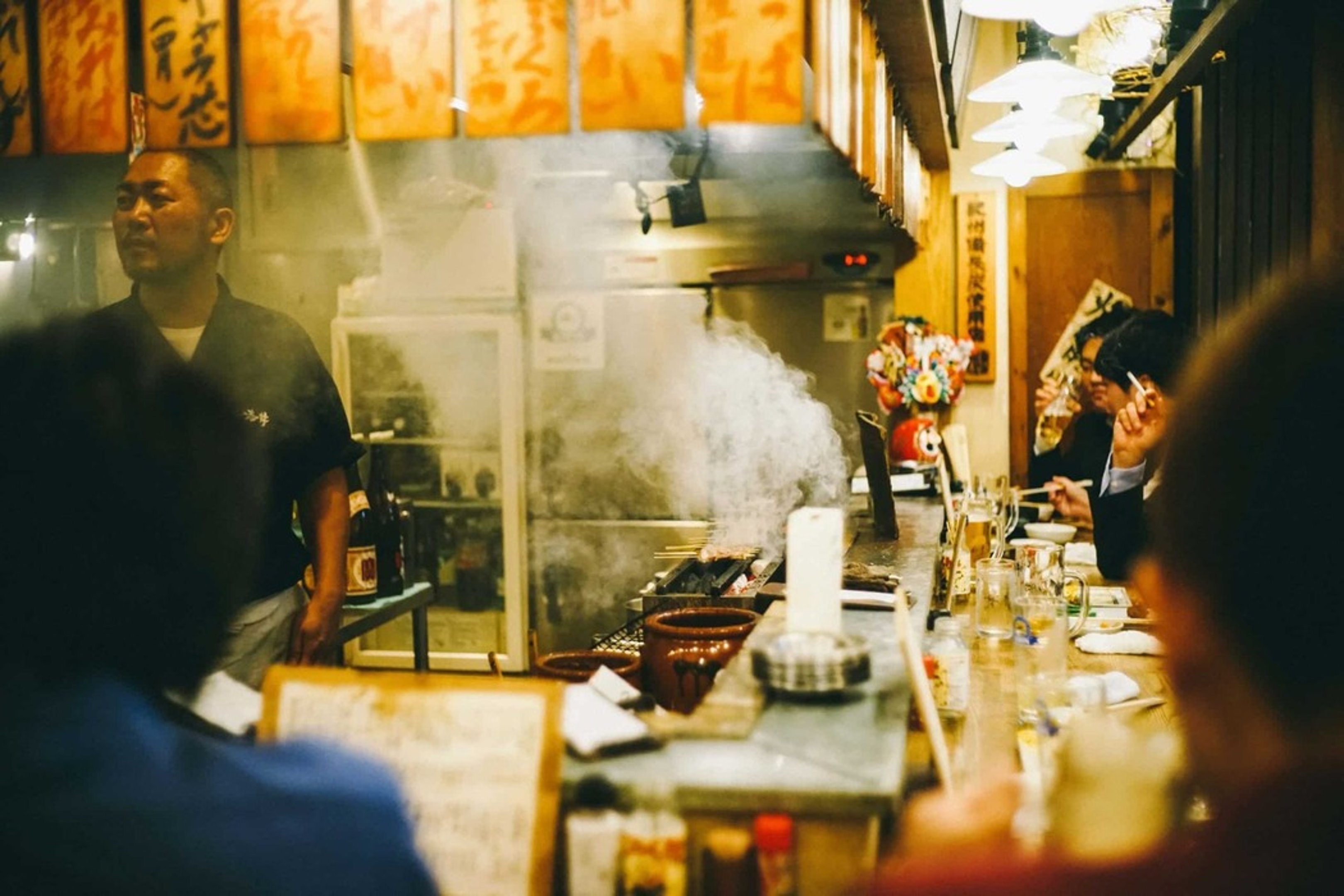 solo travel in Japan on a budget - eating at Izakaya