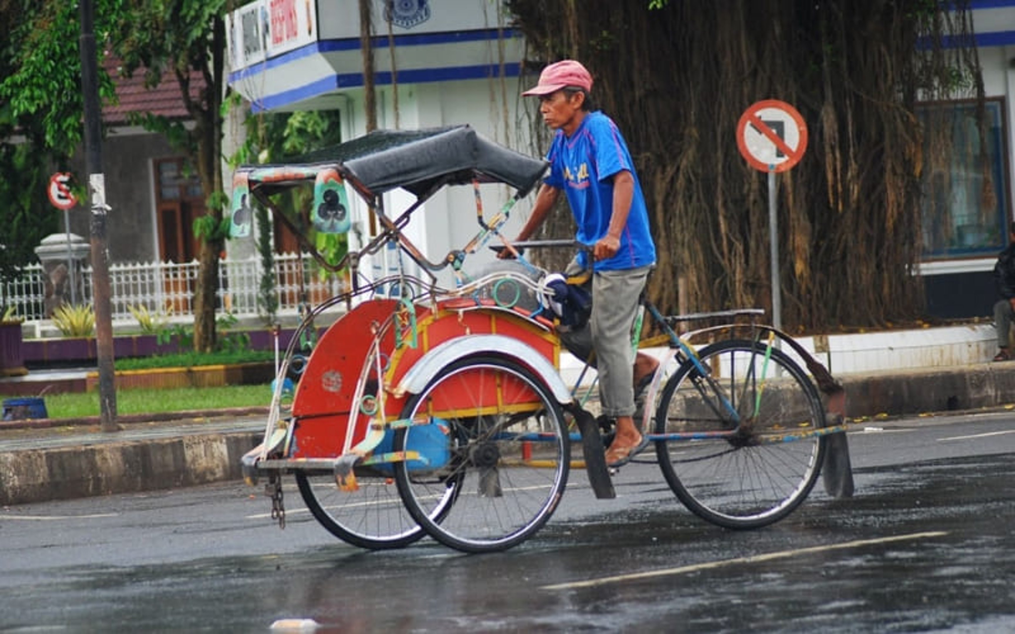 Becak is a traditional way to get around in Indonesia