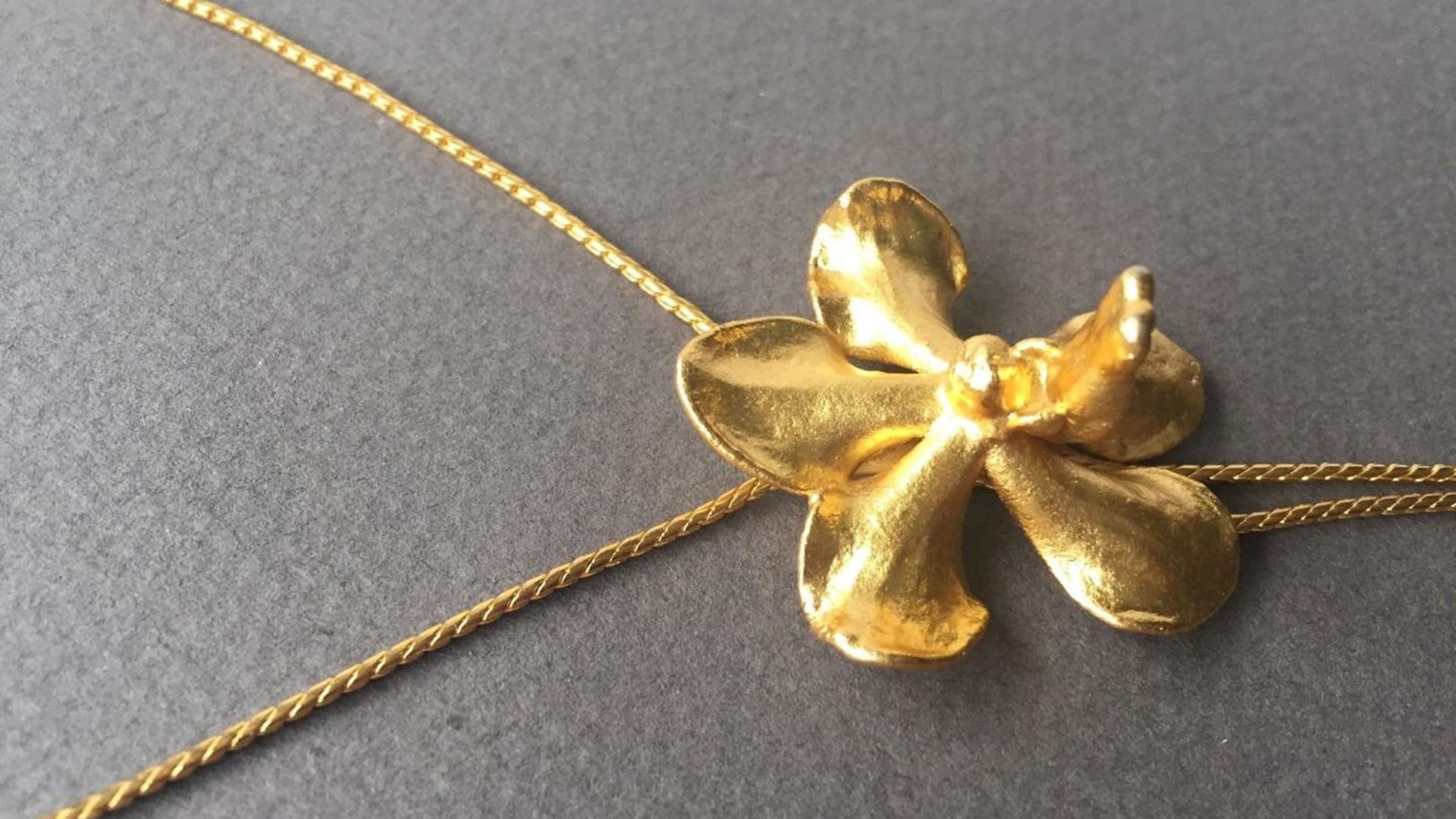 Gold Plated Orchid Jewelry is what to buy in singapore​